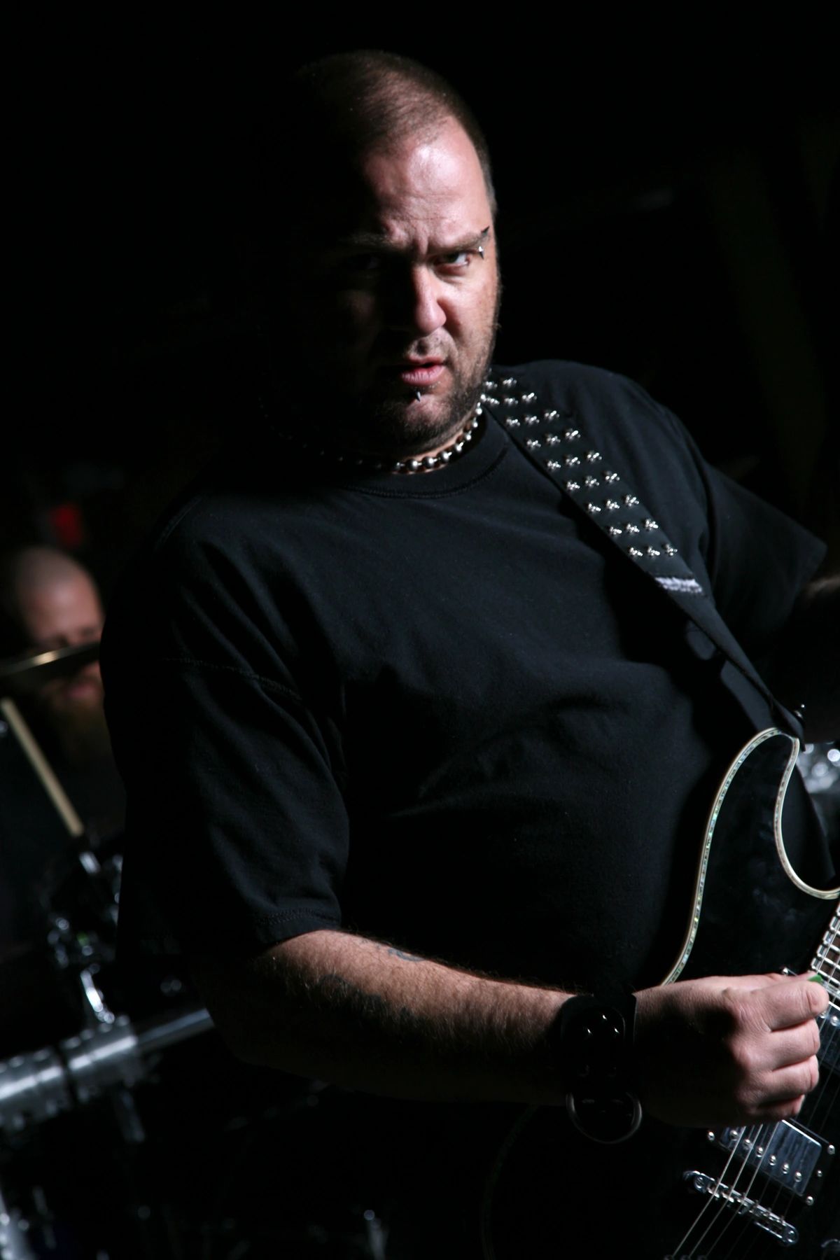 Portrait of punk guitarist representing a Rising Seas band member